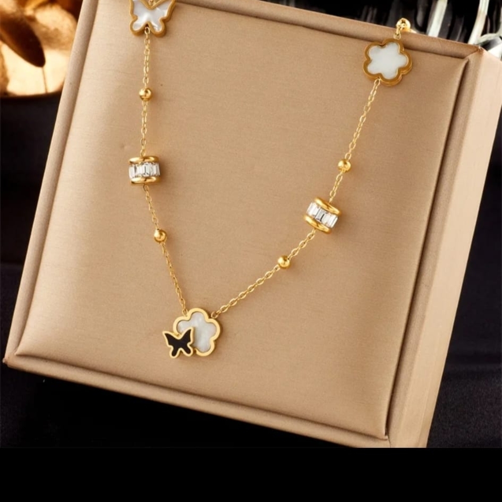 Elegant Gold and White Floral Necklace